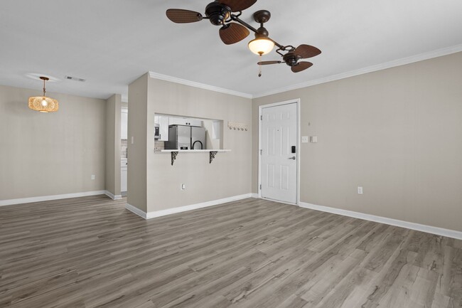 Building Photo - Welcome to Harbor Landing Condominiums — where coastal living meets convenience!