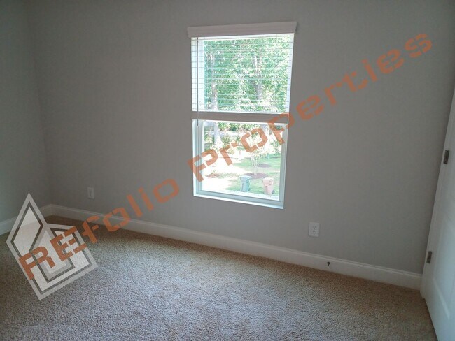Building Photo - Built in 2022! 3 Story 3 Bedroom 1-Car Gar...