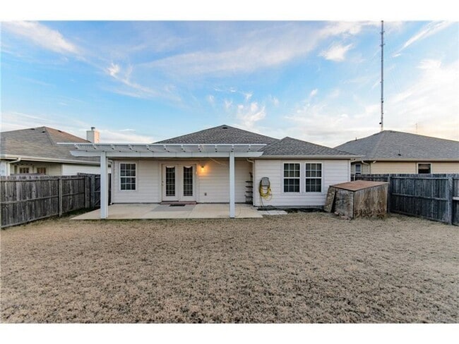 Primary Photo - Beautiful single-story home with a front g...