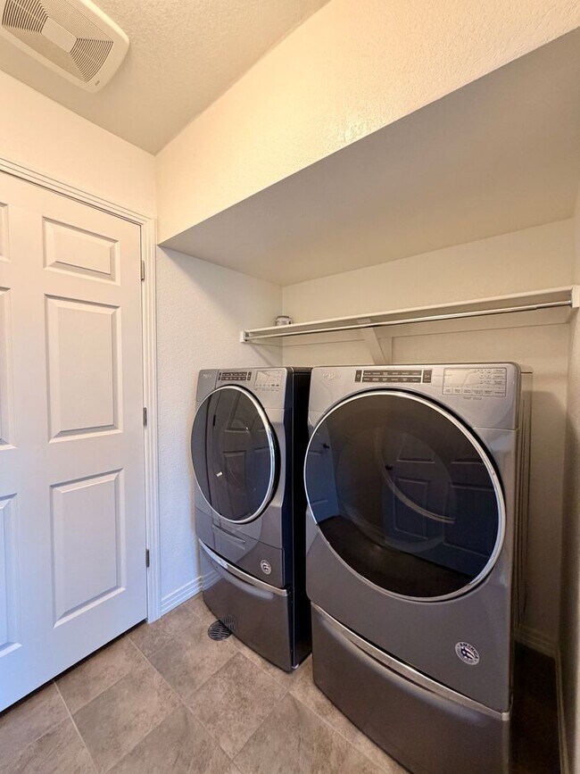 Building Photo - Move-In Ready 3-Story Townhome with Loft & 2-Car Garage