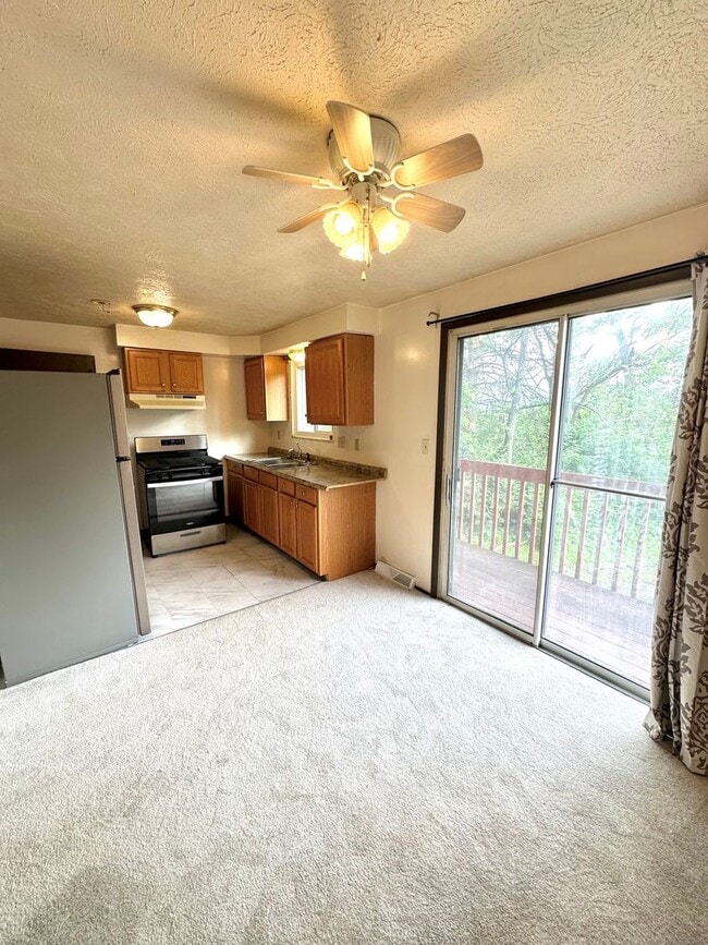 Building Photo - Well-Maintained 2 Bed, 1 Bath Townhome in West Mifflin - Private Balcony, Central AC & Heat - Ava...