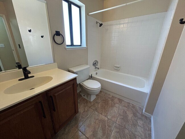 Building Photo - BEAUTIFULLY RENOVATED HOME WITH NEW PAINT, CARPET, AND LIGHT FIXTURES