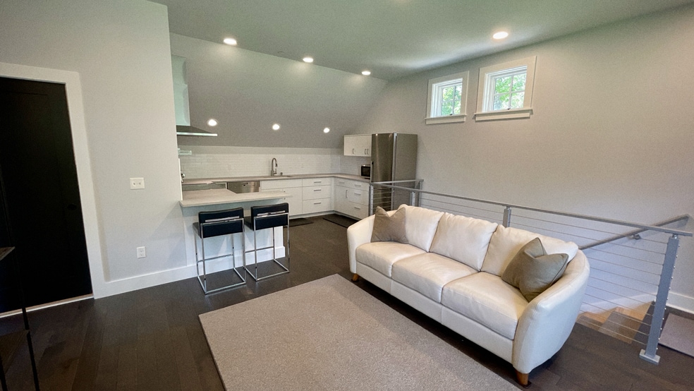 Living room looking towards open kitchen - 297 Durham Point Rd