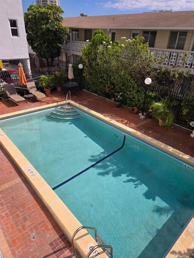 Building Photo - 7440 Harding Ave