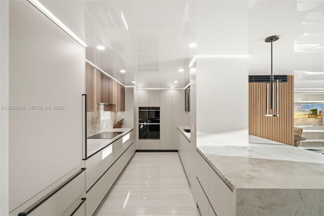 Building Photo - 5555 Collins Ave