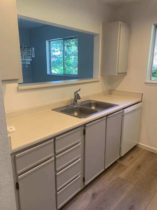 Building Photo - $1,700 - One Bedroom Condo, INCLUDES WATER...