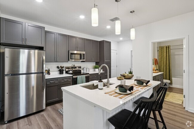 Building Photo - Revello Apartments