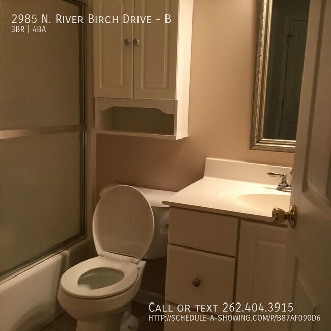 Building Photo - Huge condo with 2 car garage!