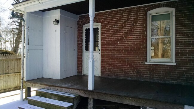 covered back porch storage closet - 506 Brown St