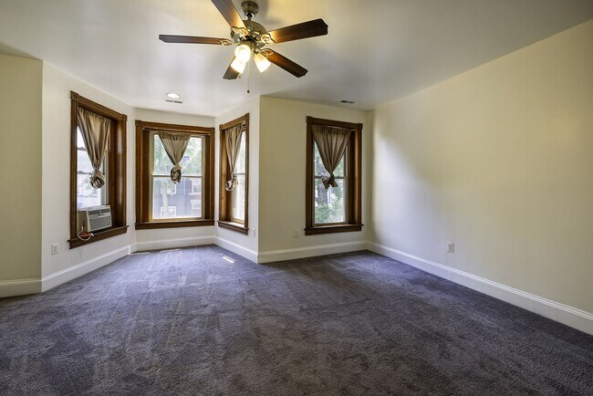 Building Photo - Historic & Charming 3BR Rowhouse near Howard is Move-in Ready!