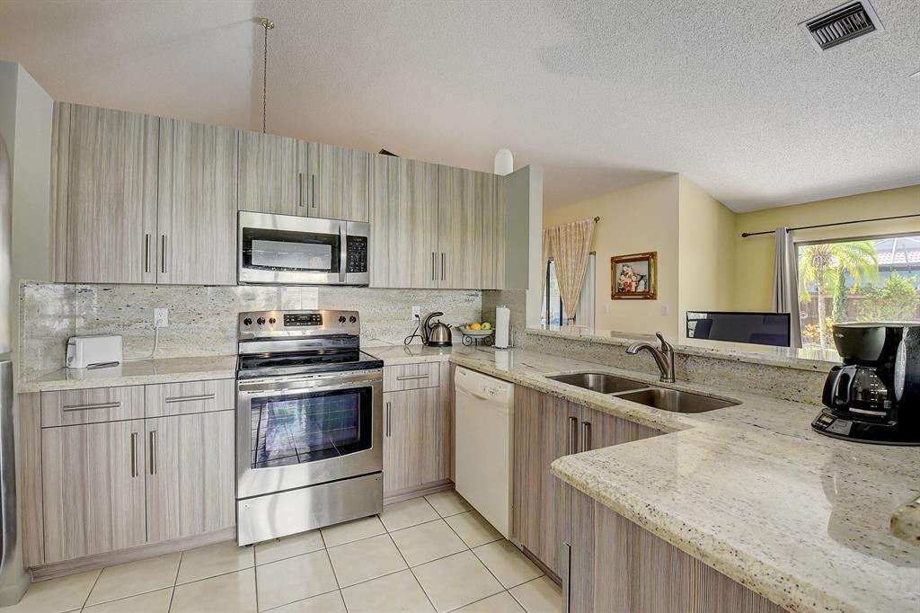 Building Photo - 9565 El Clair Ranch Road ., Boynton Beach, FL 3343