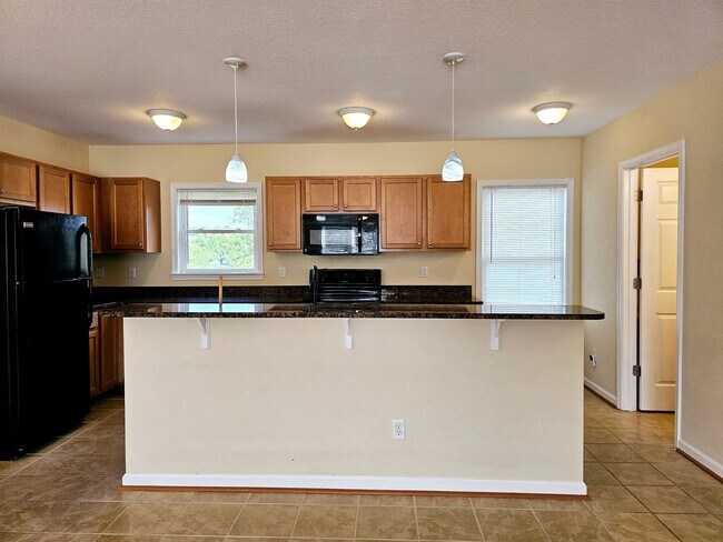 Building Photo - 135 S Comanche Cluster