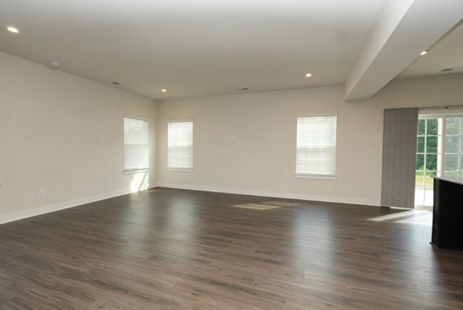 Building Photo - This wonderful home has a covered rocking chair front porch