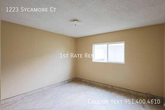 Building Photo - 1223 Sycamore Ct