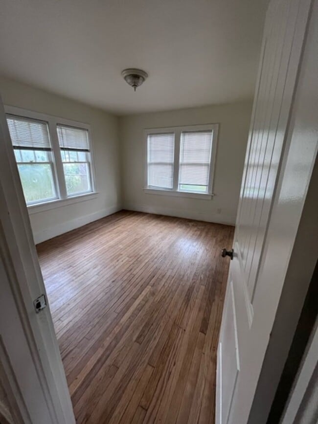 Building Photo - Super Charming - Wood Floors Throughout