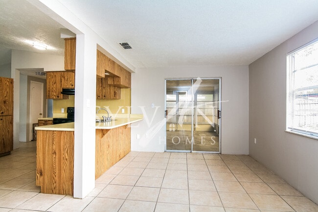 Building Photo - The living is easy in this 3 bedroom, 2 ba...