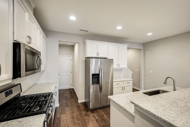 Building Photo - Contemporary, spacious 3-bedroom, 2.5-bath...