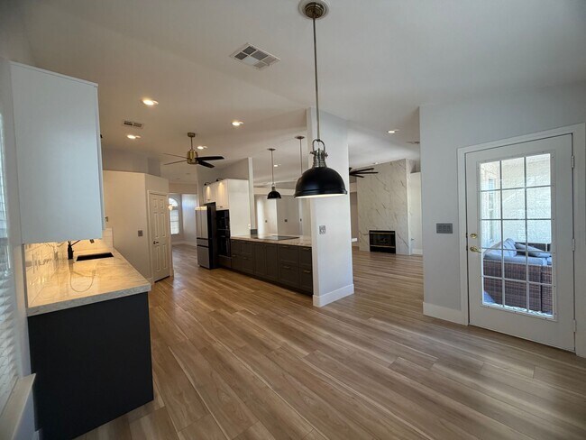 Building Photo - BEAUTIFULLY UPGRADED SINGLE FAMILY HOME - 3 BEDROOM, CORNER LOT WITH VAULTED CEILINGS
