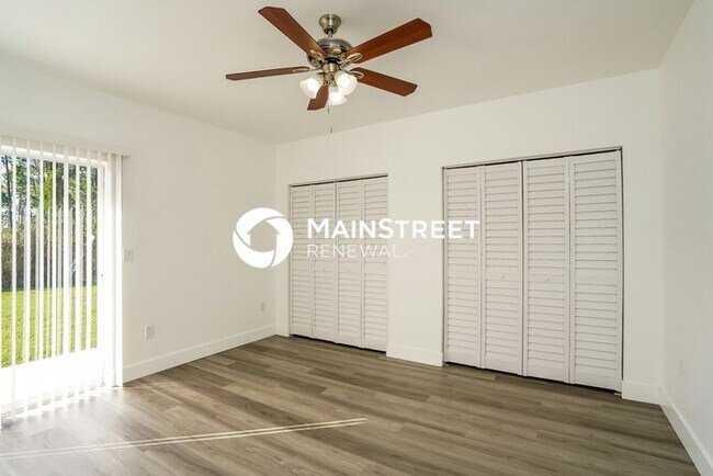 Building Photo - 4 Bedroom Pet-Friendly Home in LEHIGH ACRES, FL with Main Street Renewal
