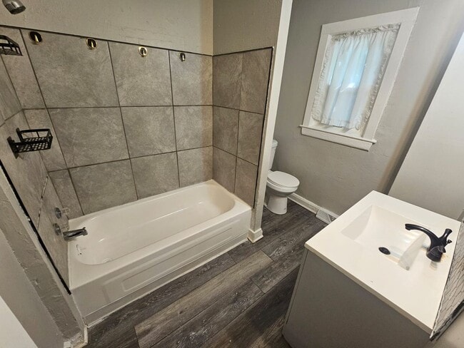 Building Photo - Spacious 4-Bedroom Cleveland Home with Updated Flooring & 2-Car Garage