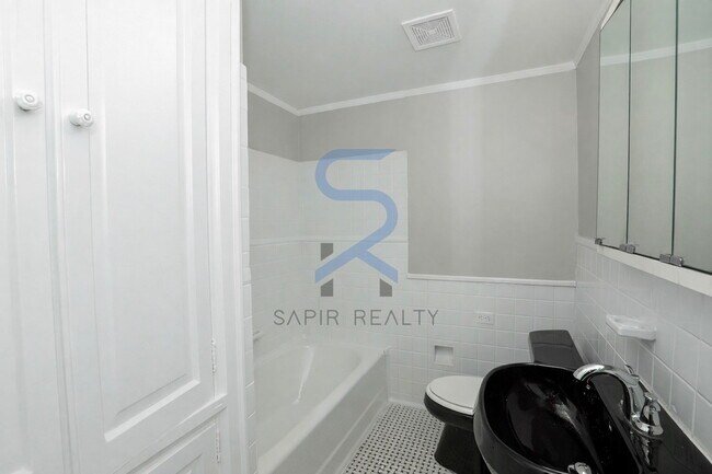 Building Photo - Move in before February 15th and choose your reward: a $250 Amazon Gift Card or a 55" Smart TV!