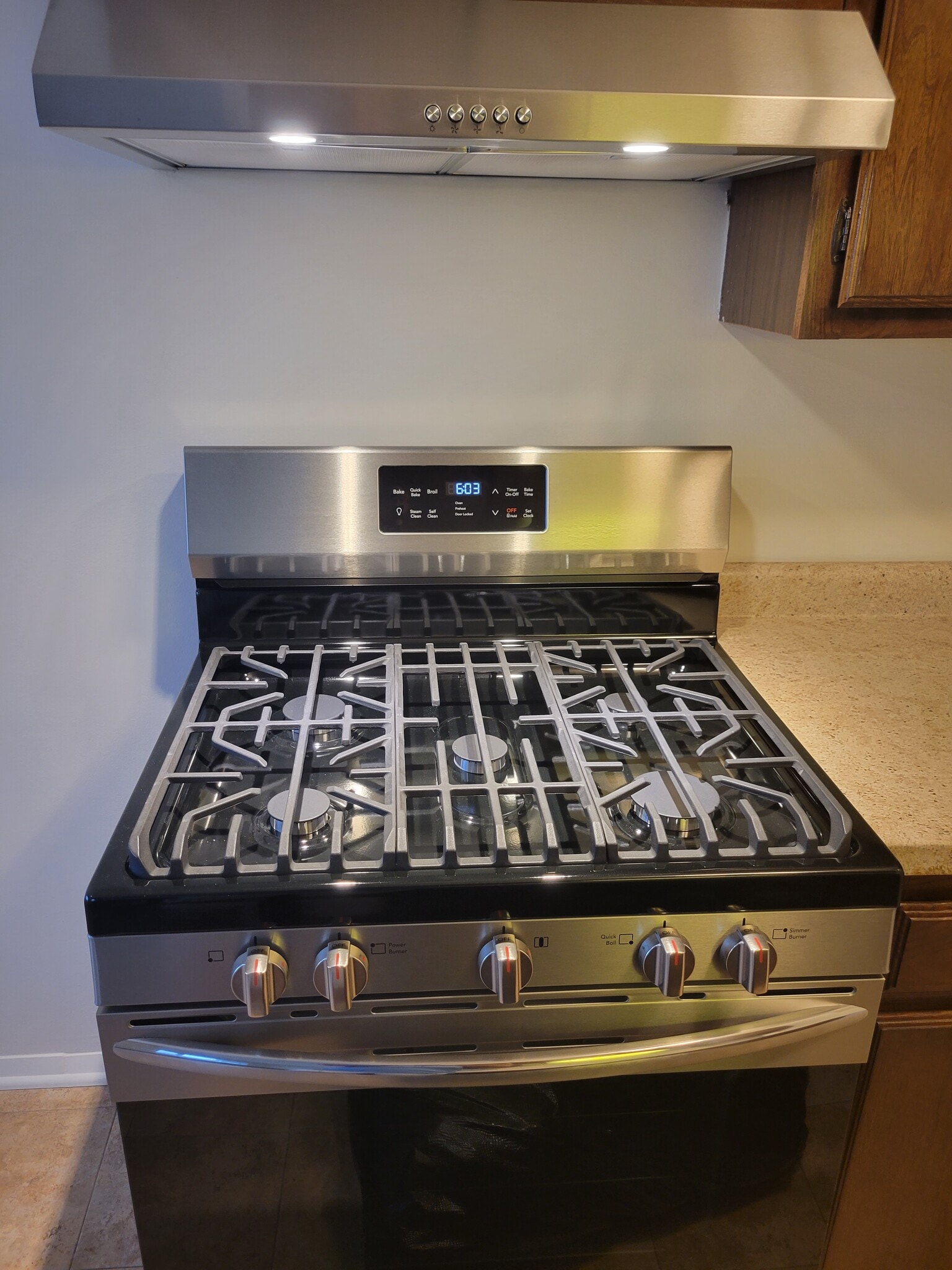 New SS Stove - 8613 W Foster Ave