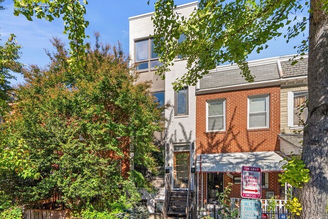 Building Photo - Stylish 2-Level Condo with Private Yard & Chef’s Kitchen Near Petworth Metro!