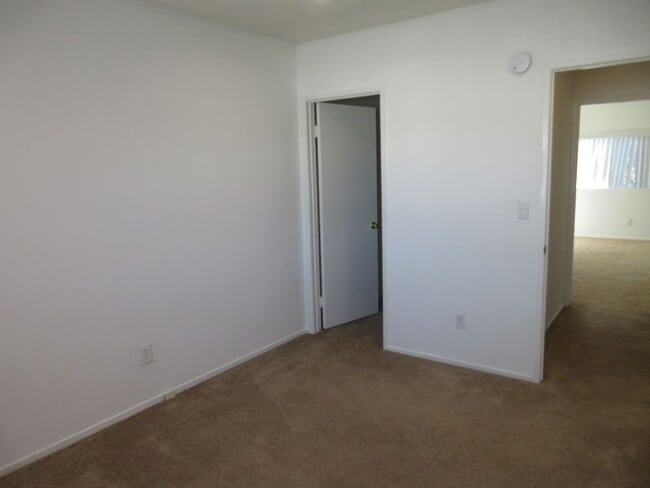 Building Photo - Duggan Property Management, Inc presents  *Reduced*  Canoga Park- 3BD 2.5BA