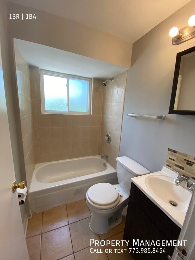 Building Photo - 8850 S Saginaw Ave