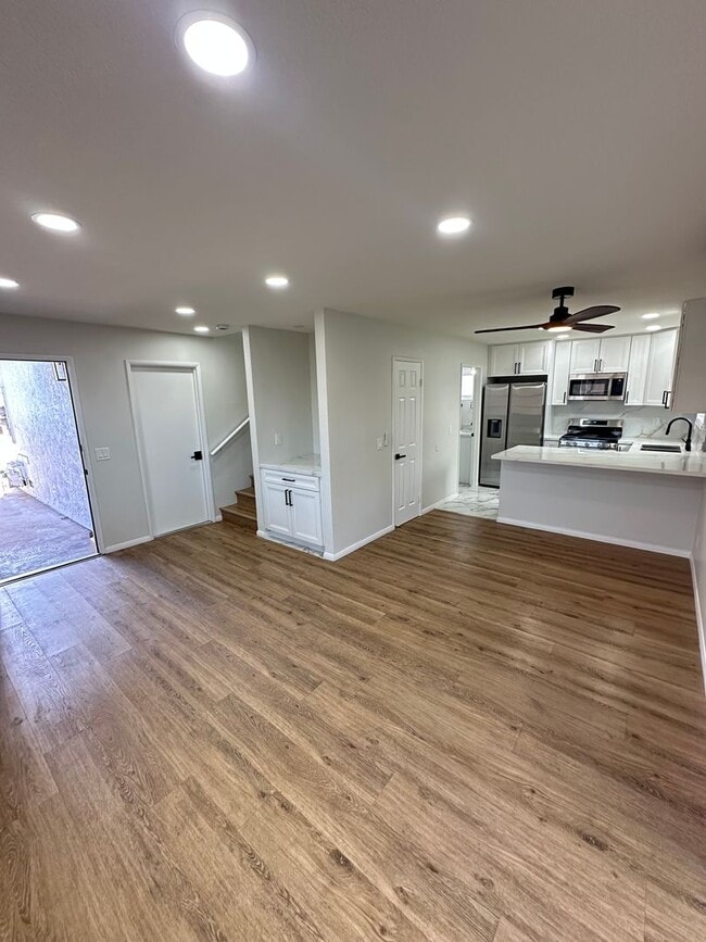 Building Photo - Remodeled 2 Story 3BR/2BA House with Vinyl plank flooring, Fenced backyard & 2 Car garage and more!