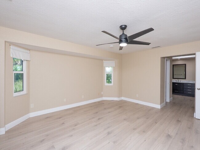 Building Photo - 3 BEDROOM • 2 BATHROOM • PRIVATE POOL • WATERFRONT • BOAT LIFT • ZERO DEPOSIT MOVE-IN AVAILABLE