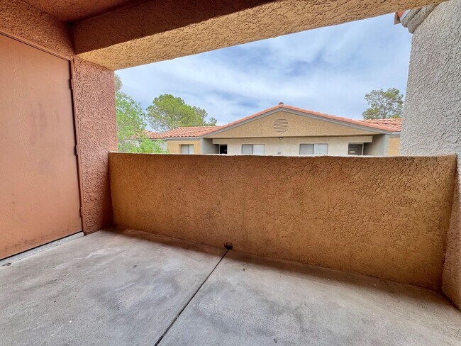 Building Photo - THIS SECOND-FLOOR DESERT SHORES CONDO OFFE...