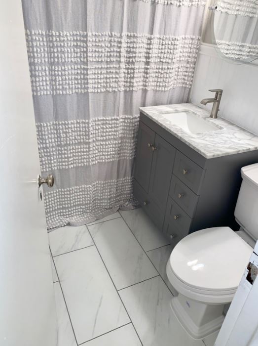newly rennovated bathroom - 201 N Trenton St