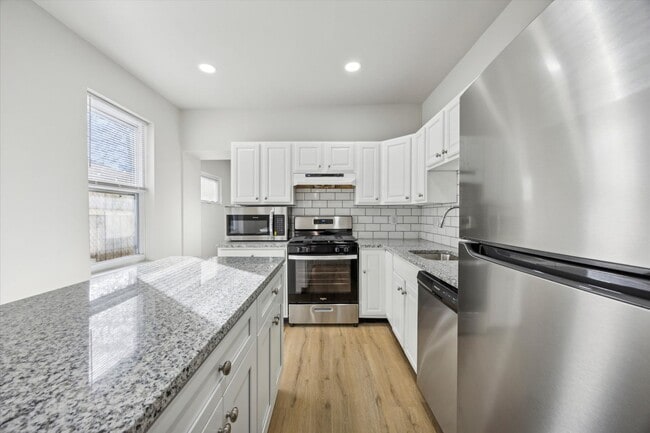 Building Photo - Stunning 4-Bedroom Townhome in the Heart of Francisville! Available NOW! Last Month’s Rent waived...