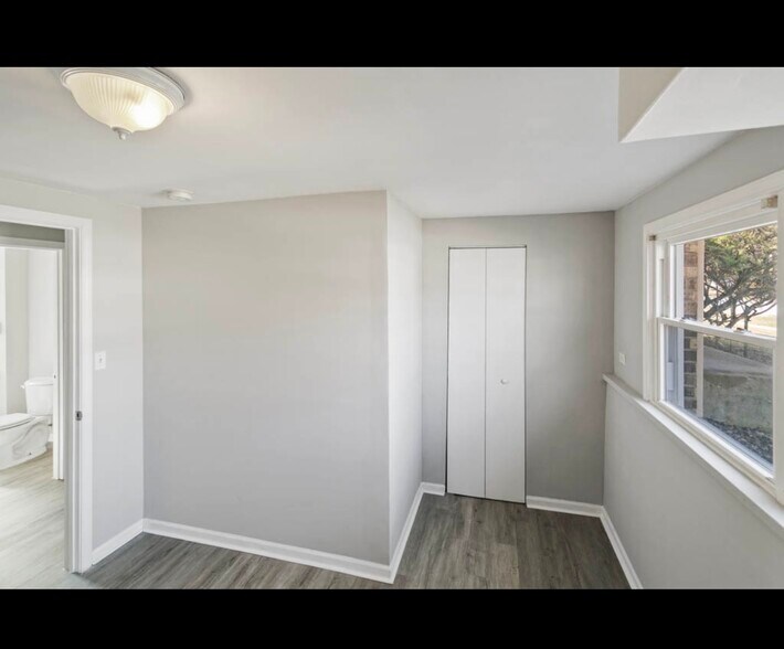 Bedroom lower level. - 3421 Birchwood Dr