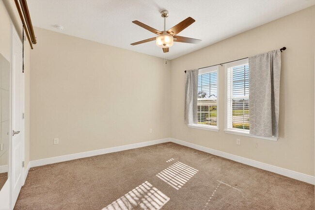 Building Photo - Modern 4-Bedroom Rental with Screened Patio & 2-Car Garage