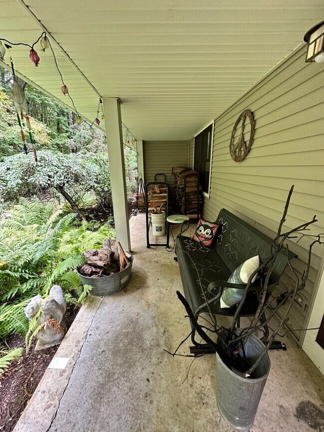 Building Photo - Dream Home in Highland, Michigan: Your Private Oasis on 5 Wooded Acres