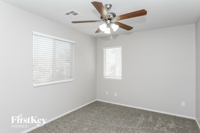 Building Photo - 7600 Scarlet Tapestry Ct