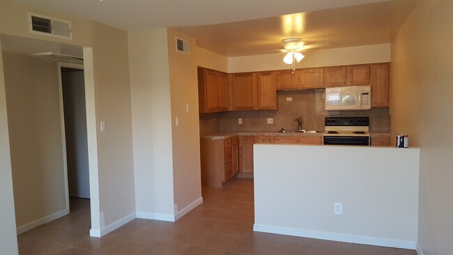 Kitchen has a refrigerator too (just not in this photo!) - 909 S Priest Dr