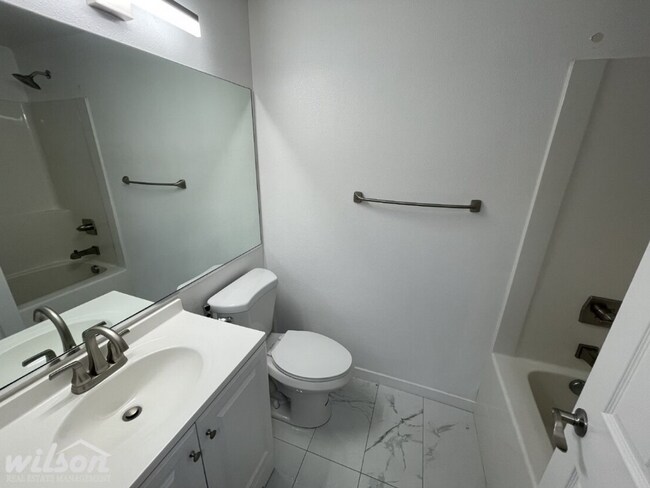 Building Photo - 3 Bed, 2 Bath Home with a Two-Car Garage, Fenced Backyard, and Lawn Care Included