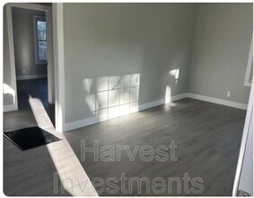 Building Photo - Welcome to Your Next Home with Harvest Investments!