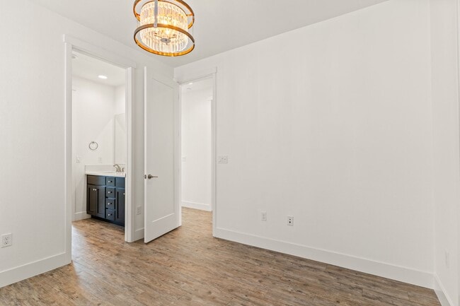 Building Photo - Sun-Filled Corner 4BR w/ Dual Yards & Panoramic Indoor-Outdoor Flow