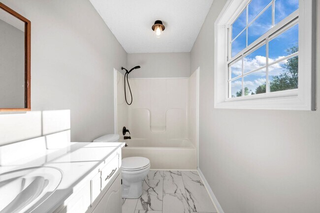 Building Photo - Charming Brick Home with Soaring Ceilings & Updated Finishes!
