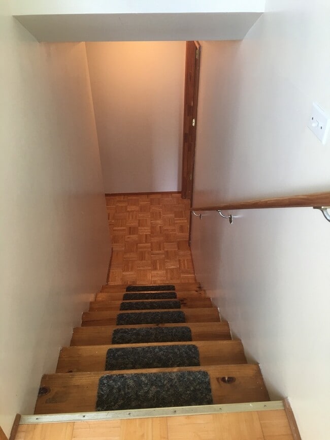 Building Photo - Beautiful secluded 4 bedroom 2.5 bath home with 2 stall detached garage and descent sized yard