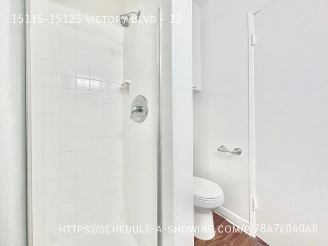 Building Photo - Updated top floor Studio apartment located...