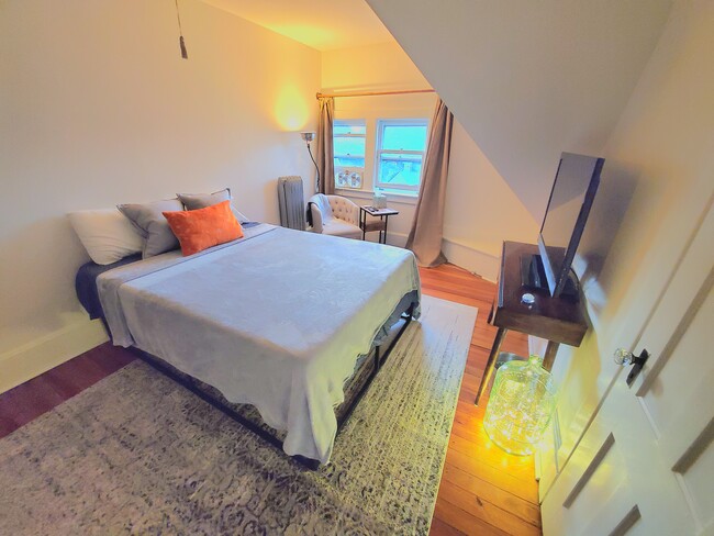 Bedroom #2 with in room HD TV and seating area! - 116 Fairview Ave