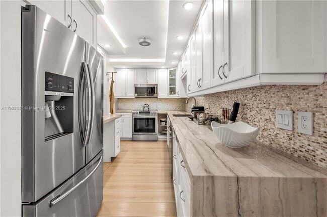 Building Photo - 10185 Collins Ave