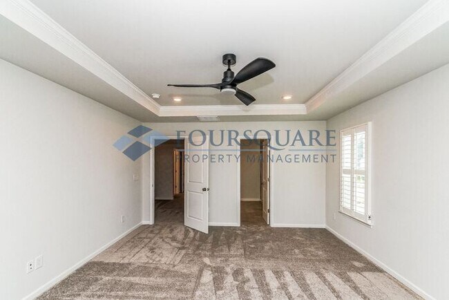 Building Photo - Modern End-Unit Townhome with 2-Car Garage | Pet Friendly