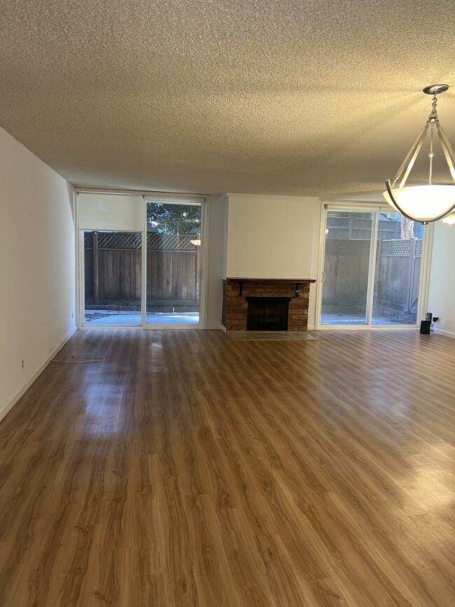 Large living area with gas fireplace - 6435 Green Valley Cir