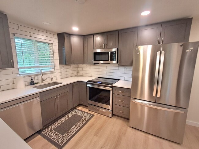 Building Photo - $2,595 - 4 Bed / 3 Bath Home with Fully Fe...